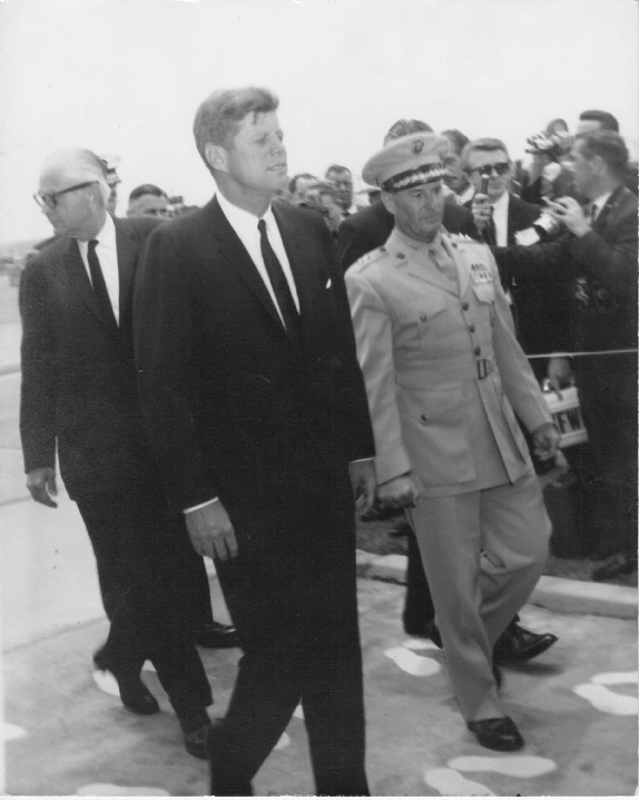 President Kennedy walks next to Major General Wade