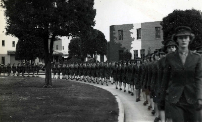 women Marines marching in women's compound MCRDSD 1944